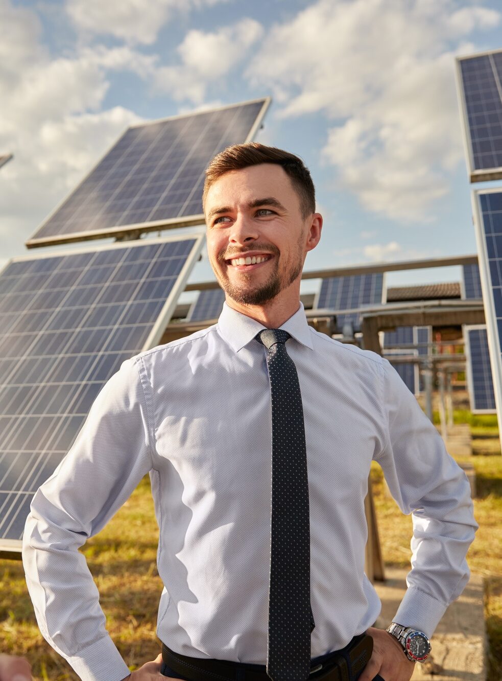 Engineers in field with solar panels