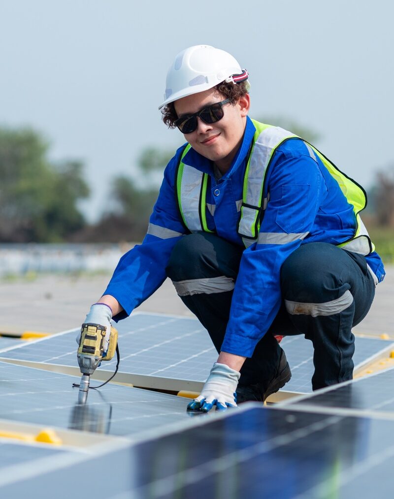 Solar Engineer Performing Panel Maintenance